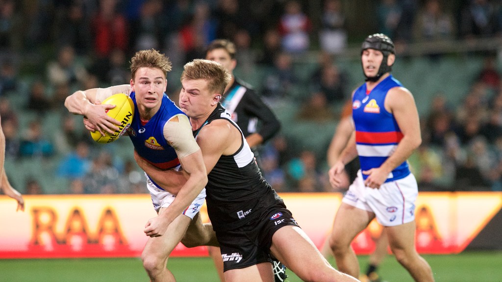Ollie Wines lays a tackle against the Bulldogs last week. Photo: Michael Errey/InDaily