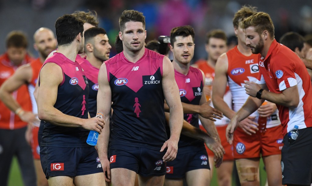 Jesse Hogan (front) after Melbourne's loss to Sydney. Photo: AAP/Julian Smith