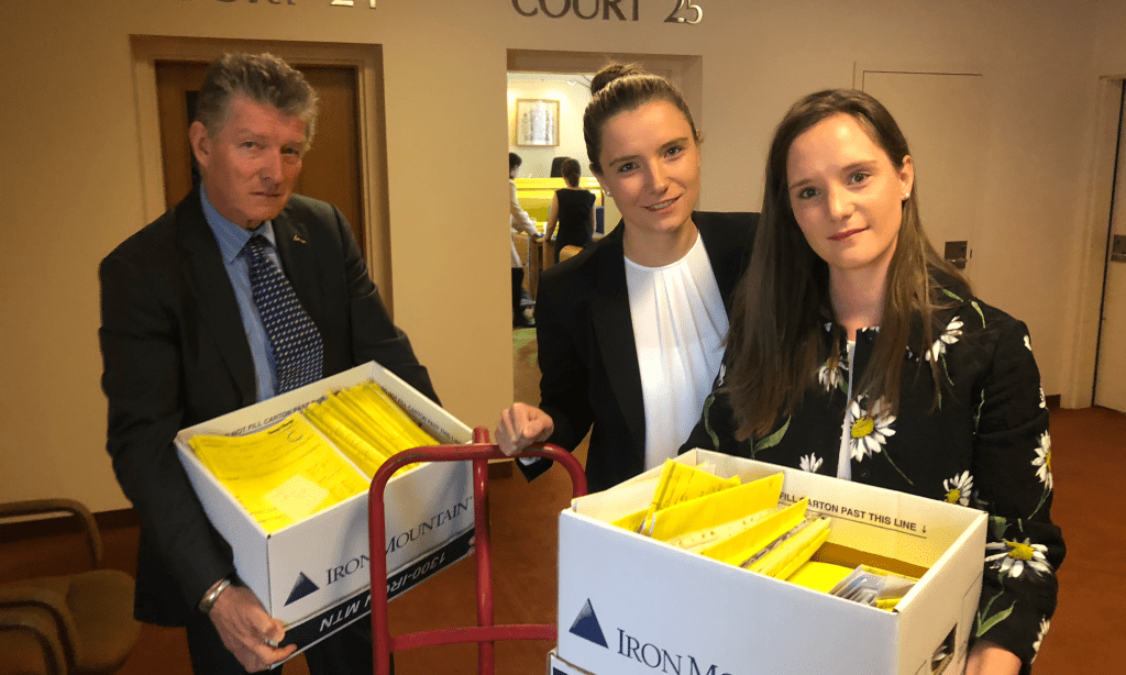 Anthony, Suzannah and Genevieve Toop after today's District Court hearing. Photo courtesy of SA Real Estate News
