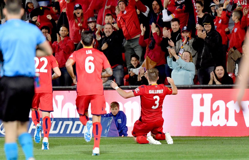 Scott Galloway, the unsung signing of the off-season, celebrates his goal for Adelaide United on Friday. Photo: AAP Image/Sam Wundke
