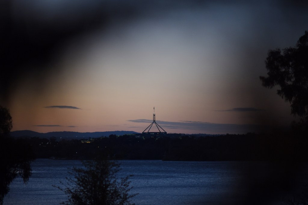 Parliament House at sunrise. Photo: AAP/Lukas Coch