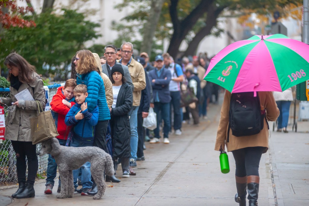 Hundreds of voters wait in line to enter a polling station in the Chelsea neighborhood of New York. Photo: Richard B. Levine