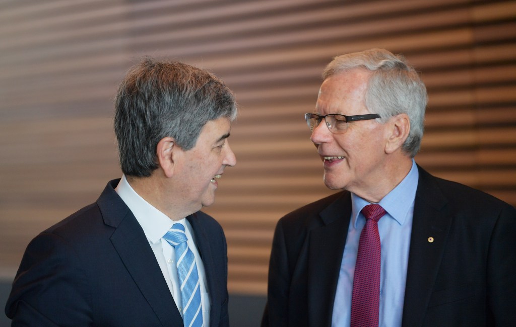 Liberal veteran Rob Lucas chats with former Premier Dean Brown at last year's party AGM. This week marks 25 years since Brown led the Liberals to victory. Photo: David Mariuz / AAP