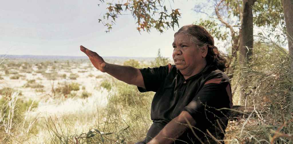 Kathleen Petyarre looking across Atnangker country, Northern Territory, December 2000. Photograph Ian North; courtesy Wakefield Press