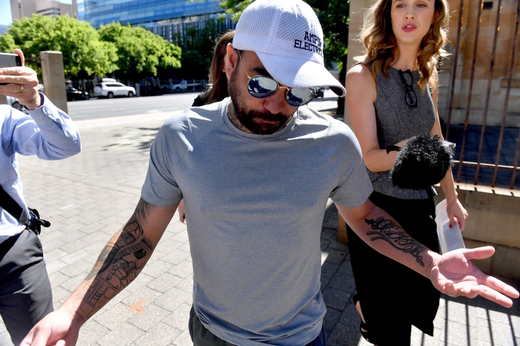 Russell Weribone leaves the Magistrates Court in Adelaide this morning. He pleaded guilty to two property damage offences after trying to set a speed camera on fire. Photo: AAP / Sam Wundke