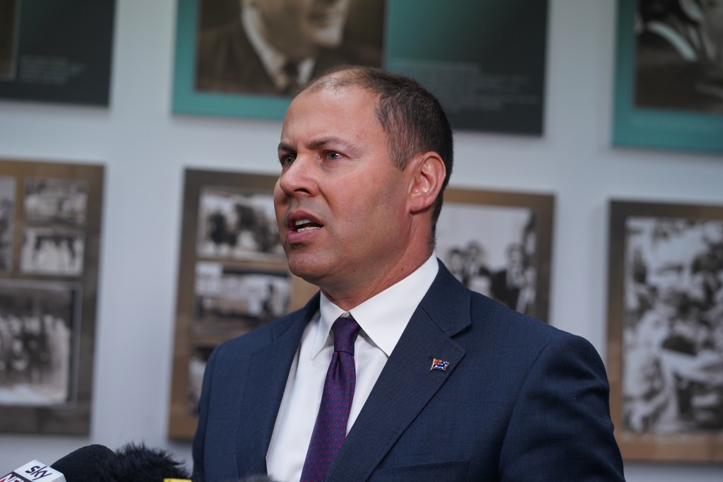 Treasurer Josh Frydenberg speaks to the media in Melbourne today. Photo: AAP/Alex Murray