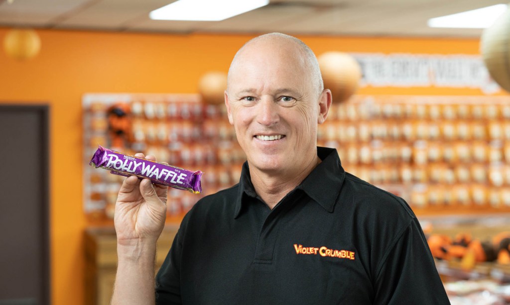 Robern Menz CEO Phil Sims with a Polly Waffle, now more than 10 years old, found among the equipment acquired from Nestlé alongside the Violet Crumble brand.