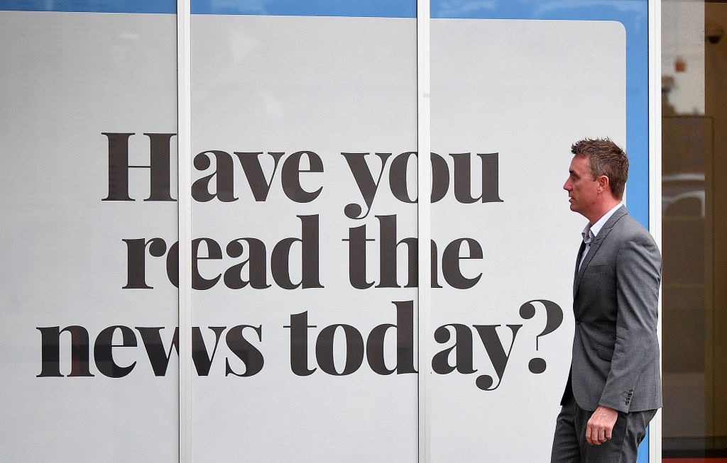 One Nation party official James Ashby leaves a press conference after being caught up in a sting by Al Jazeera. Photo: AAP/Dave Hunt