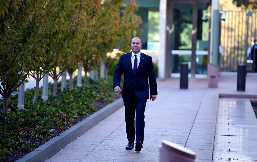 Treasurer Josh Frydenberg arrives at Parliament House today. Photo: AAP/Lukas Coch