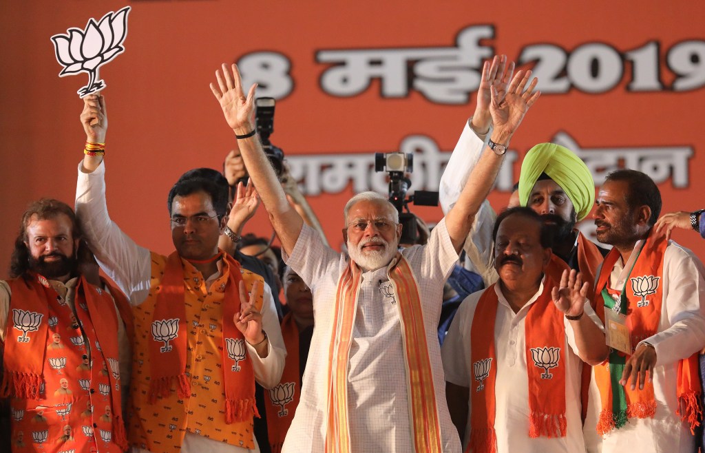 Indian Prime Minister Narendra Modi with BJP candidates during an election campaign rally in New Delhi this week. Photo: EPA/Harish Tyagi