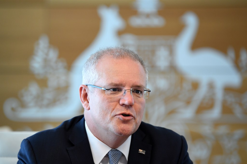 The Morrison Government is tipped to pick up as many as 78 seats. Photo: AAP/Joel Carrett