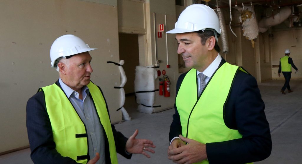 Premier Steven Marshall with then-CEO of Renewal SA John Hanlon at the Old Royal Adelaide Hospital site in May last year. Photo: Kelly Barnes / AAP