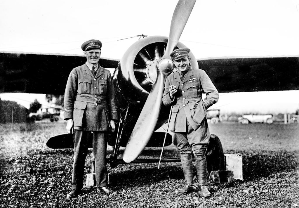 Harry Butler, right, with engineer Harry Kauper with the Red Devil. Photo: Ron Blum