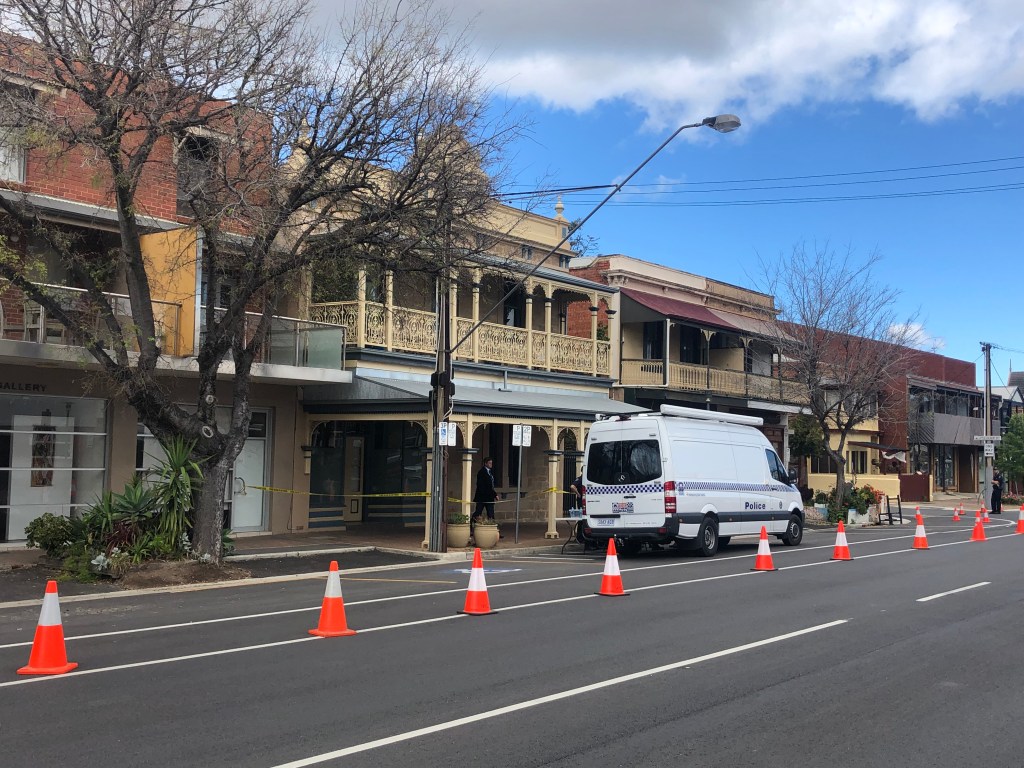 The Sturt St house is cordoned off by police this morning.