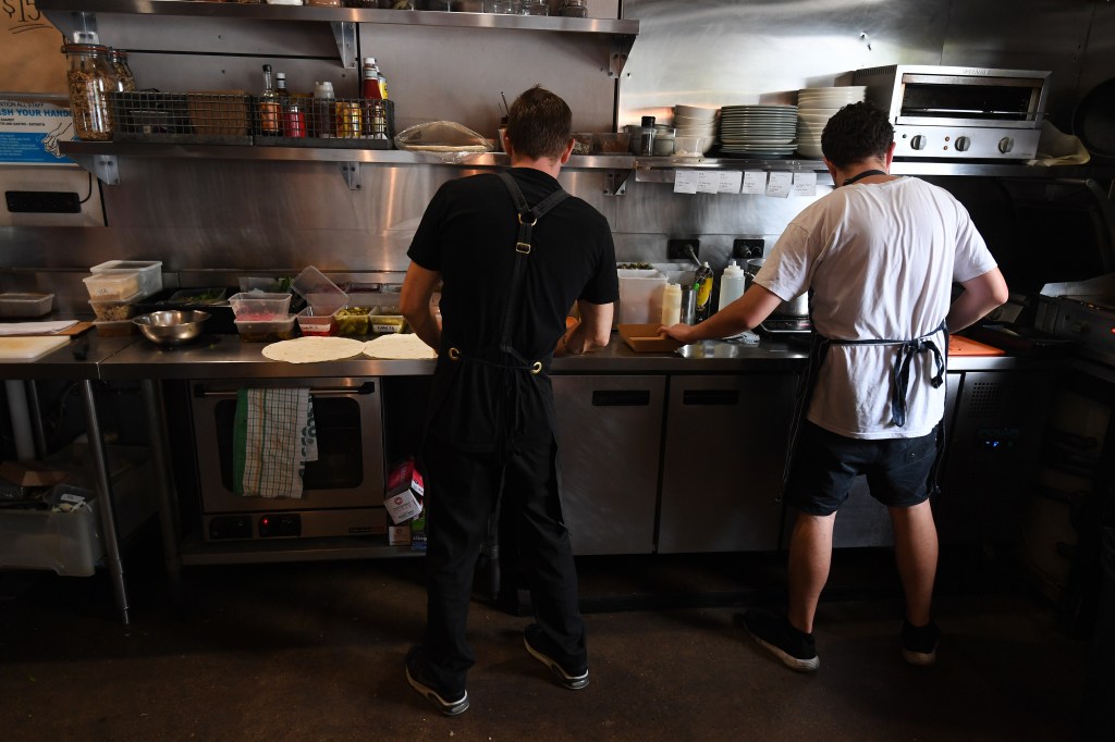 Hospitality accounted for a third of all wage underpayment reports. Photo: AAP/Dan Peled