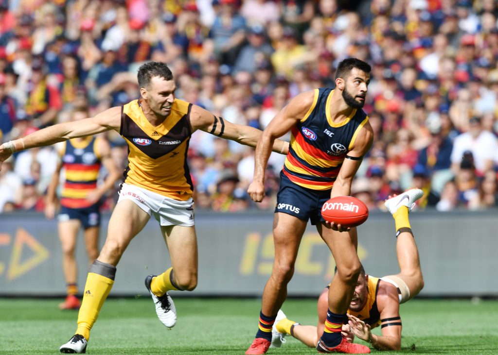 Wayne Milera in action against Hawthorn in round one last year. Photo: AAP/David Mariuz