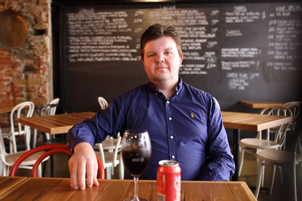 Kurtis Eichler with a Coke at Peel St. Photo: Tony Lewis/InDaily