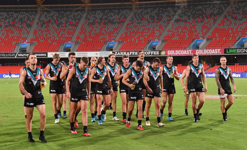 Power players after their game on the Gold Coast. Photo: Darren England / AAP