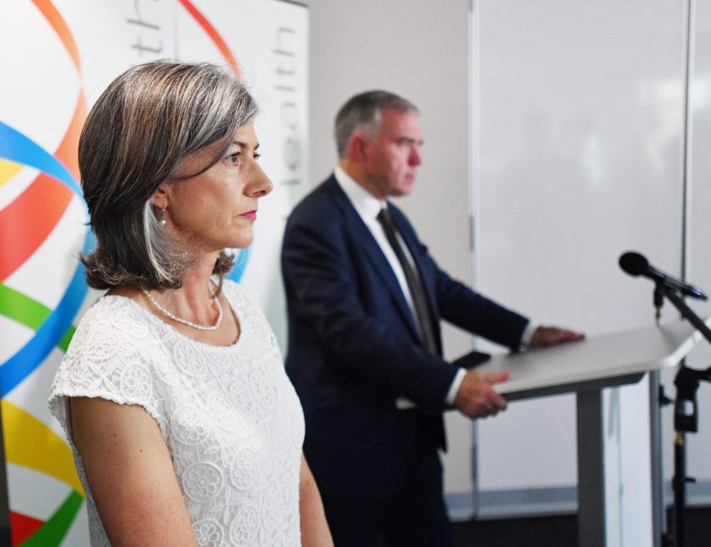 South Australian chief public health officer Nicola Spurrier looks on as South Australian Health Minister Stephen Wade speaks to the media. Photo: AAP/David Mariuz