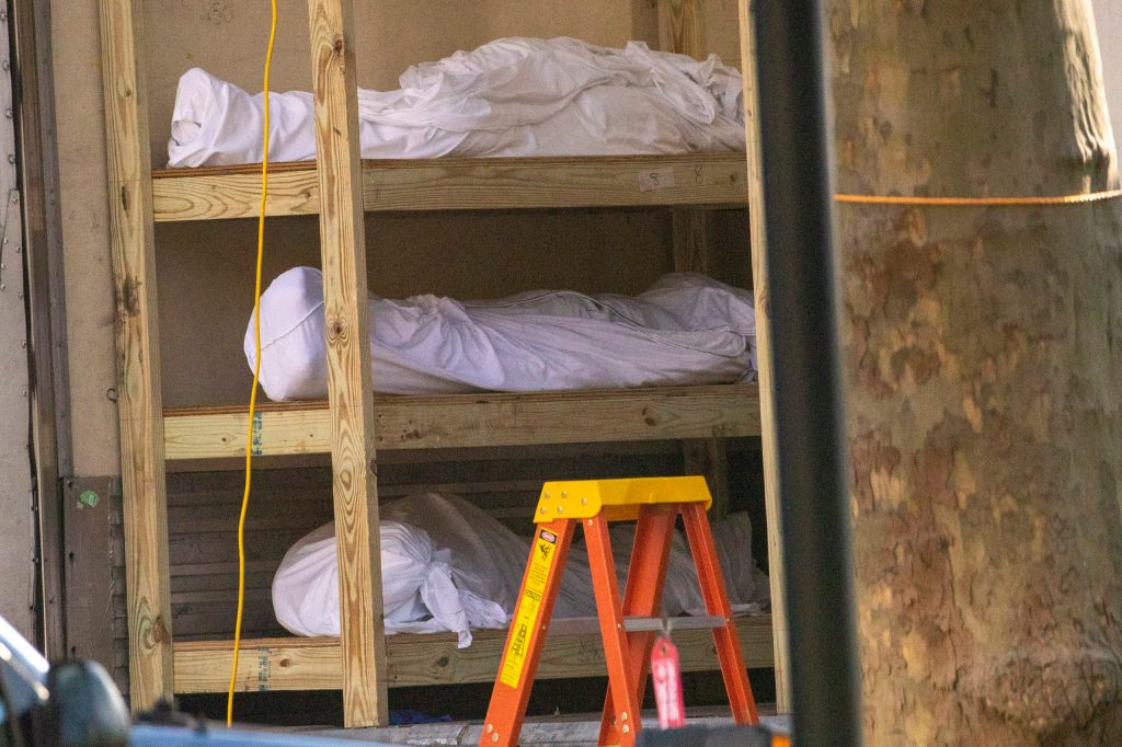 Bodies are stacked in a refrigerated container outside a New York medical centre. Photo: AP /Mary Altaffer