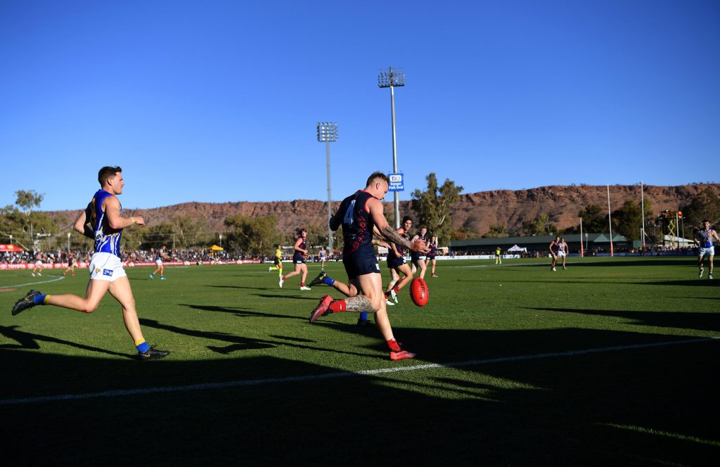 The AFL might play more games in Alice Springs, like last year's clash between Melbourne and  West Coast. Photo: AAP Image/Dan Peled
