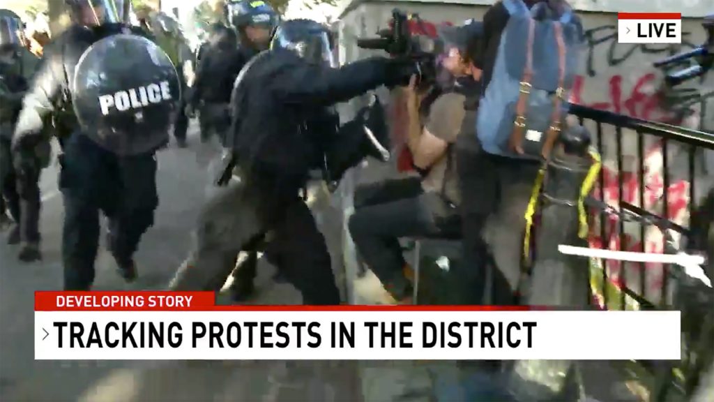 Washington police punched and clubbed a Network Seven crew while clearing protesters from a park near the White House so Donald Trump could walk through for a photo opportunity.  Photo: AAP/ABC 7 News via Twitter