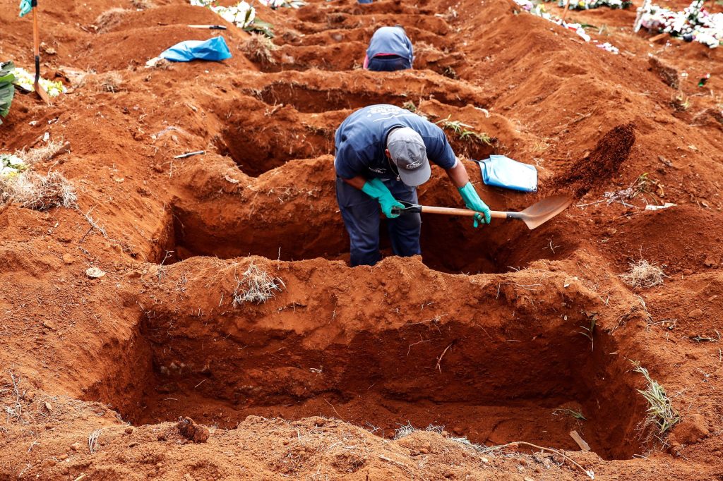 Fresh graves in Sao Paulo, as Brazil's COVID-19 cases and deaths soar. Photo: EPA/Sebastiao Moreira
