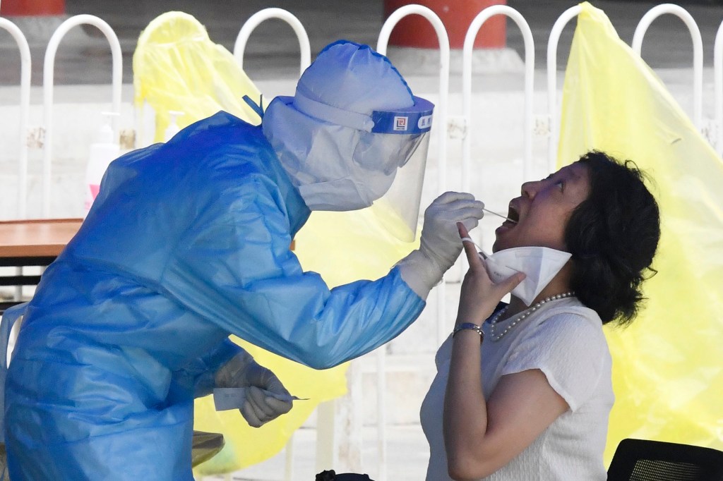 Testing in Beijing amid a new surge of coronavirus infections. Photo: supplied