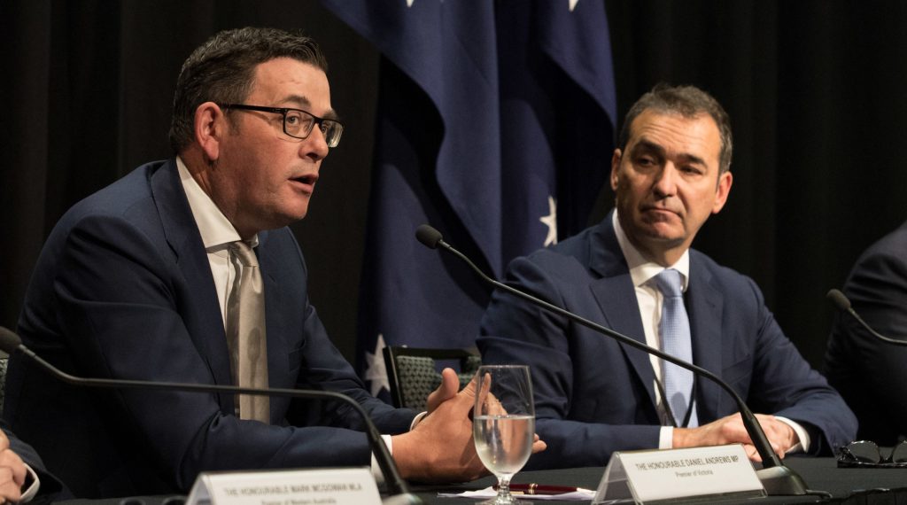 SA Premier Steven Marshall with Victorian Premier Daniel Andrews (left) at a 2019 COAG meeting. Photo: Marc McCormack / AAP