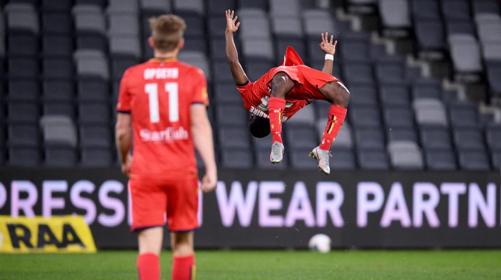 Adelaide United's Pacifique Niyongabire his goal against the Glory. Photo: AAP/Dan Himbrechts