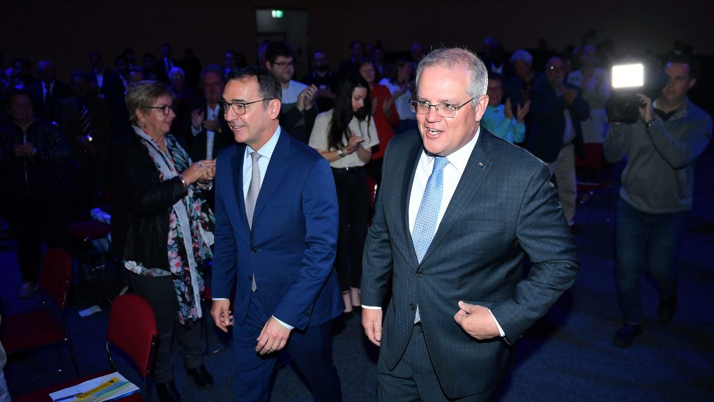 Prime Minister Scott Morrison and South Australian Premier Steven Marshall arrive at the South Australian Liberal Party AGM in Adelaide on Saturday. Photo: AAP/Mark Brake.