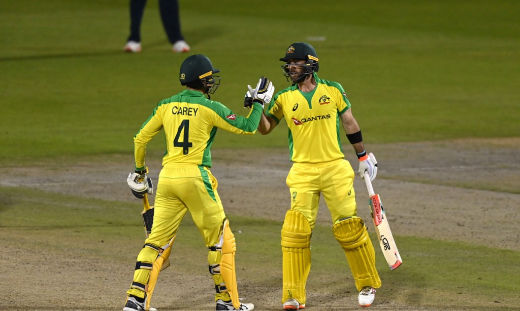Australia's Glenn Maxwell (right) and Alex Carey starred in the victory against England in Manchester this morning. Picture: Shaun Botterill/NMC Pool/PA Wire.