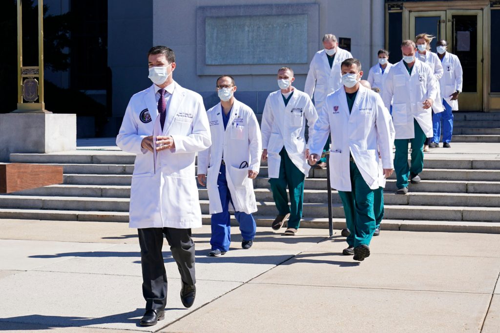 Dr. Sean Conley, physician to US President Donald Trump, and a team of doctors attend a briefing at Walter Reed National Military Medical Center. Photo: AP/Susan Walsh.