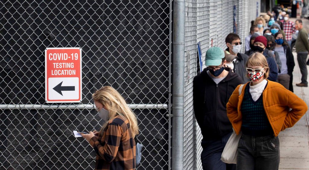 People wait in line at a COVID-19 testing location in Brooklyn, New York. Photo: EPA/Justin Lane