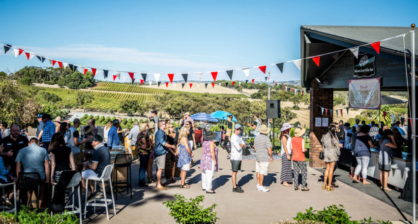From Saturday, patrons will be able to drink alcohol while standing up at outdoor areas of licensed venues. Photo: Mollydooker Wines