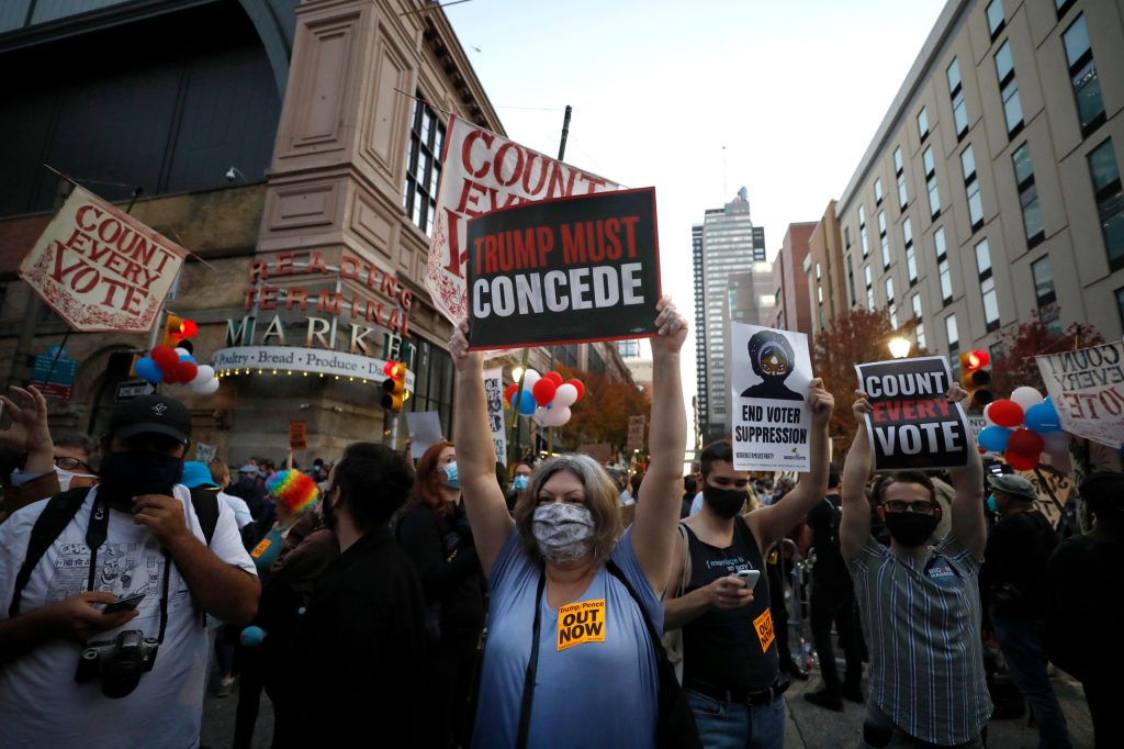 Anti-Trump protesters outside Pennsylvania Convention Center where votes are being counted in Philadelphia. Photo: AP/Rebecca Blackwell