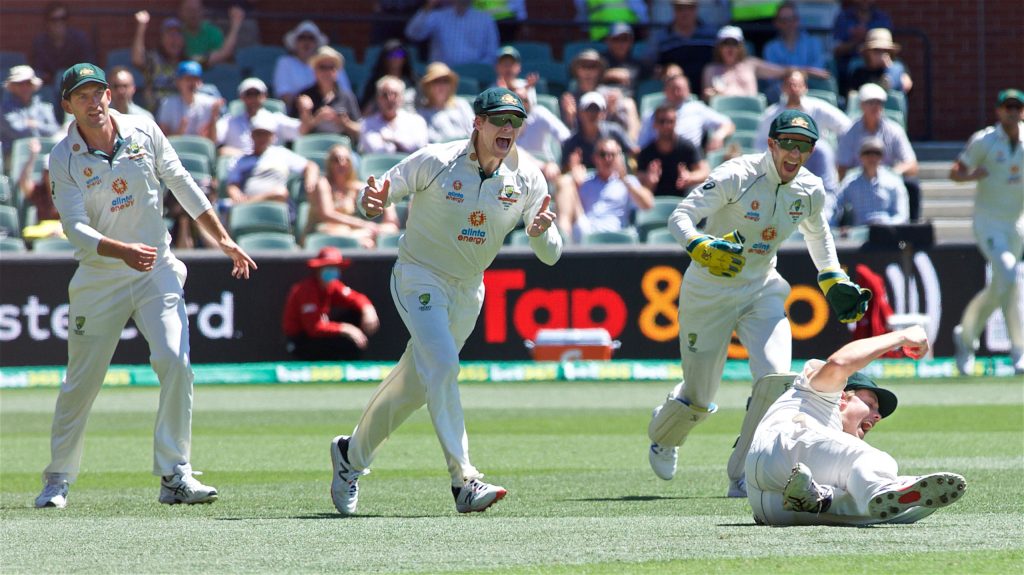 Cameron Green takes the crucial catch of Indian captain Virat Kohli at the Adelaide Oval on Saturday. Image: Errey/InDaily