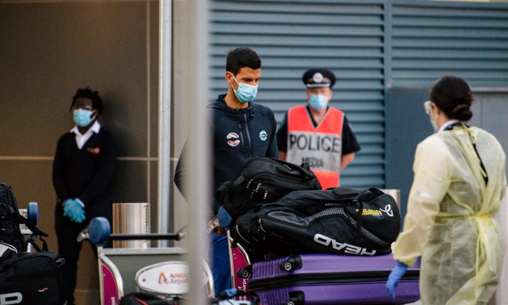 Novak Djokovic arrives at Adelaide Airport last night to quarantine ahead of an exhibition event at memorial Drive on January 29. Picture: Morgan Sette/AAP