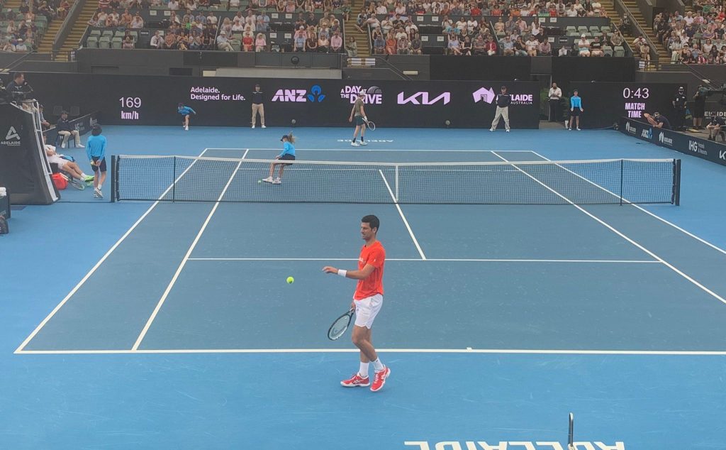 Novak Djokovic belatedly takes to the court at Memorial Drive. Photo: Daniel Gannon via Twitter