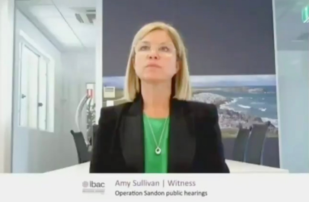 Amy Sullivan appearing at last month's IBAC hearing via video link. Photo: Screenshot of IBAC livestream, via 9 News Melbourne