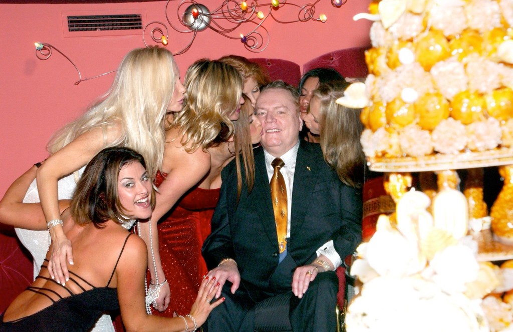 Larry Flynt celebrates his 60th birthday at a strip club. Photo: AAP/ABACA