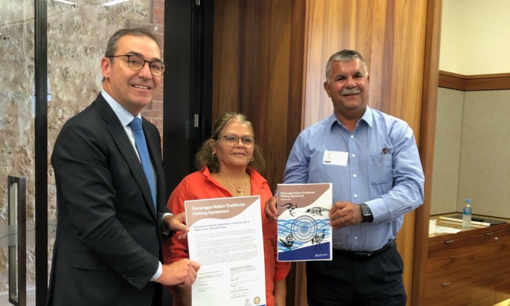 Premier Steven Marshall with Narungga Nation Aboriginal Corporation Chair Anne Newchurch and Director Doug Milera with the Traditional Fishing Agreement. Photo: Supplied 