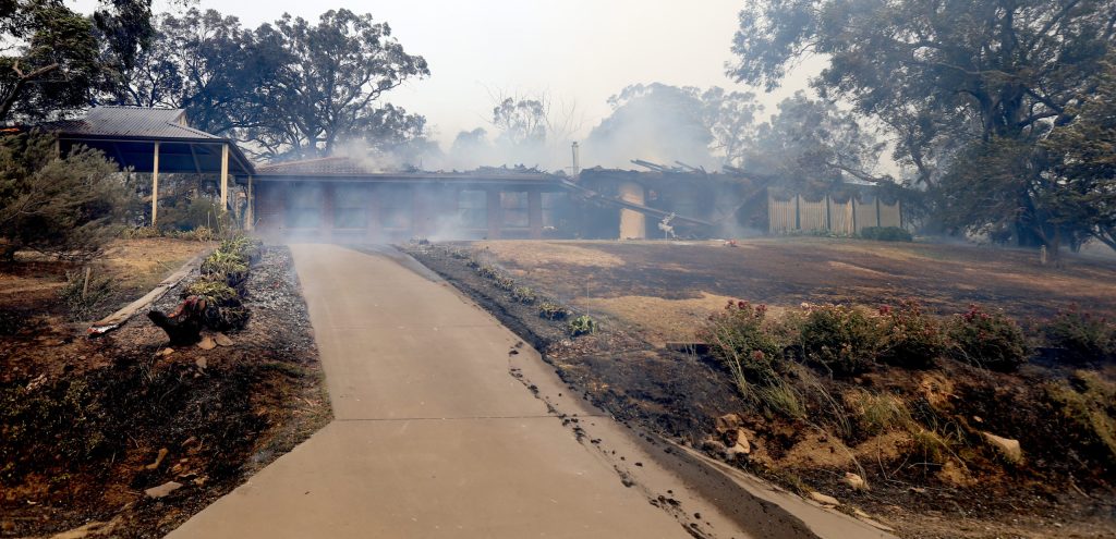 A home at Woodside during the Cudlee Creek bushfire. (AAP Image/Kelly Barnes)