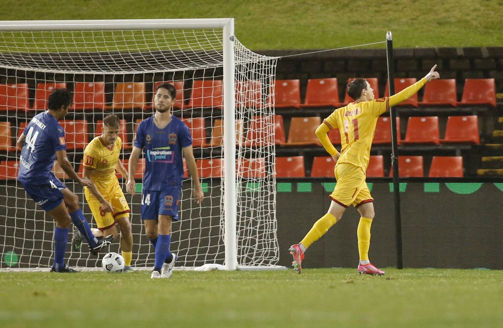 United's Craig Goodwin celebrates during Sunday's match against Newcastle Jets. Photo: AAP/Darren Pateman