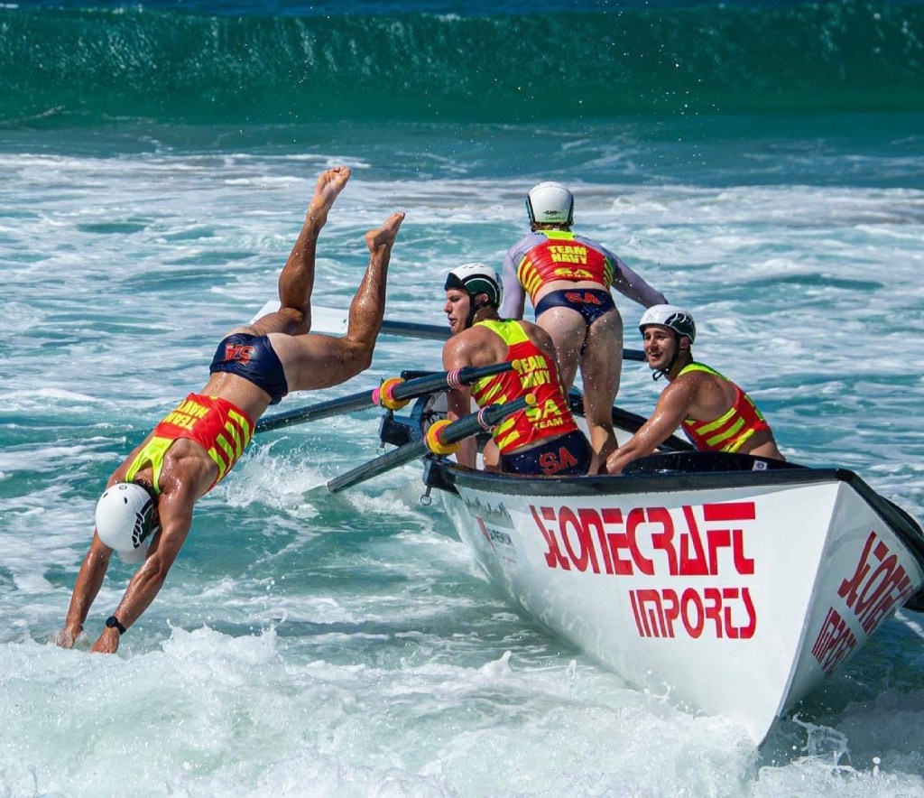 South Australia bagged a silver in the Interstate team relay at the ASRL championships in Mollymook, NSW, with the Somerton Sticky Wickets showing how to do a relay change. Photo: ASRL