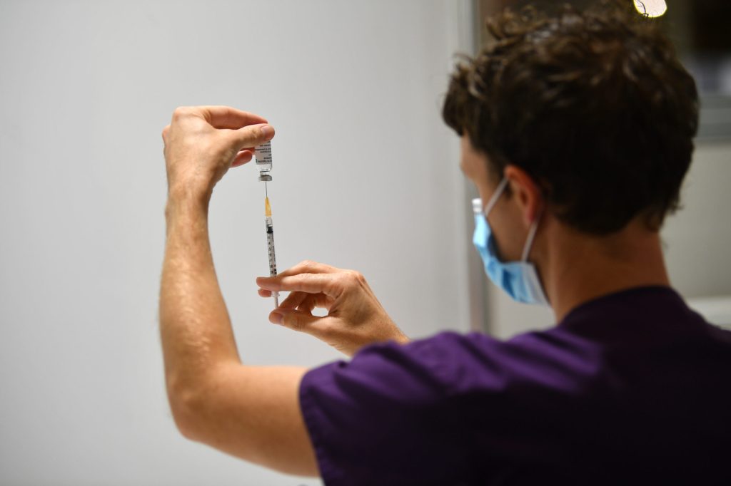 Thumbnail for Biden orders vaccination for federal workers, bigger employers