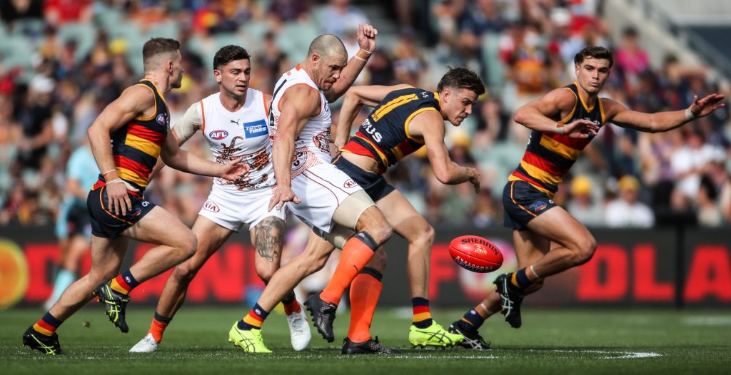 A lumbering Giant finds space against the Crows on Saturday. Photo: Matt Turner / AAP