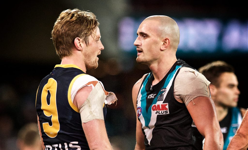 Adelaide's Rory Sloane and Port's Sam Powell-Pepper face off at the 2019 Round 8 Showdown. Photo: Michael Errey/InDaily