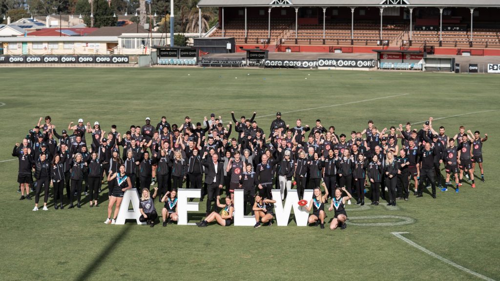 Players and staff celebrate the announcement of Port Adelaide's introduction to the AFLW today. Photo: Matthew Sampson / Port Adelaide FC