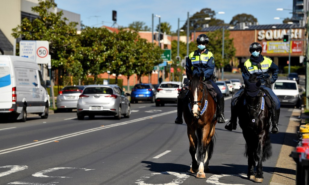 Mounted NSW Police on patrol at Liverpool in Sydney, Thursday, August 5, 2021 (AAP Image/Joel Carrett). 